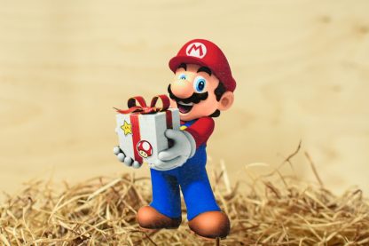 Super Mário s darčekomn zápich na tortu